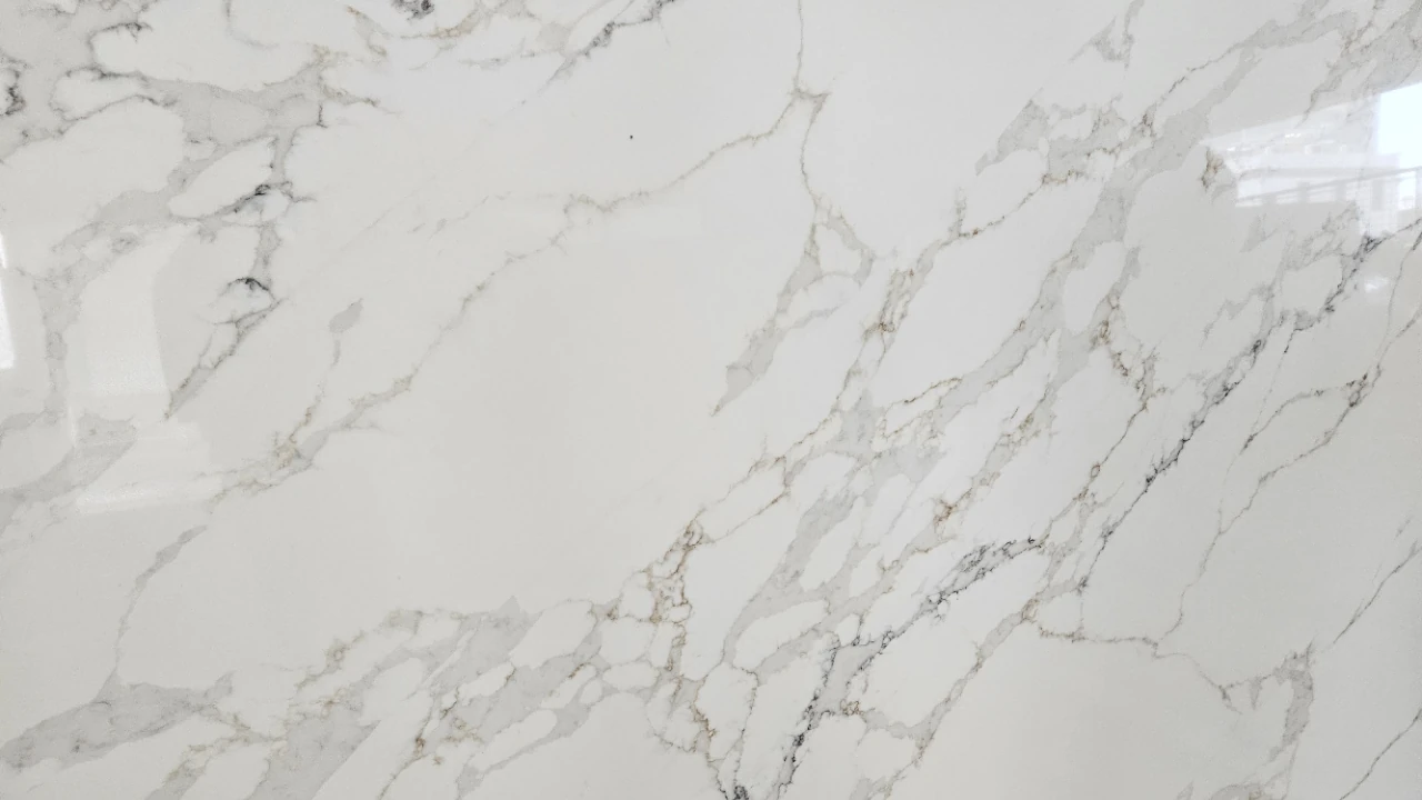 Catalog image for CALACATTA PERFETTO POLISHED N ME QUARTZ 2CM JUMBO A 128X63