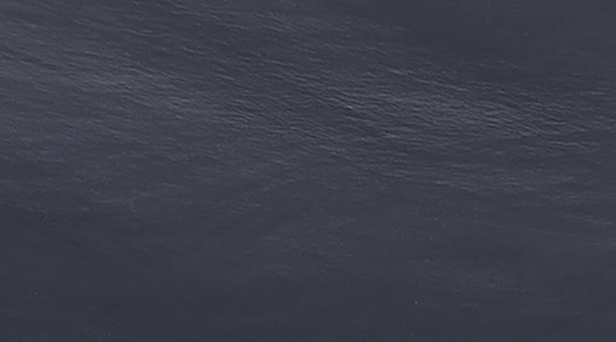 Catalog image for VULCANO BLACK ROCK BRUSHED GRANITE 2CM