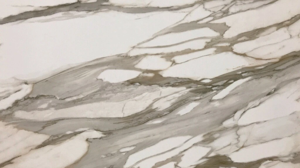 Catalog image for CALACATTA LIGHT GOLD HONED PORCELAIN 12MM A 128X64