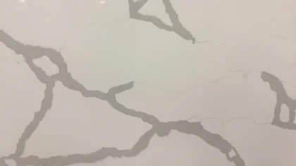 Catalog image for CALACATTA SERPENTE POLISHED ME QUARTZ 2CM JUMBO B 126X63